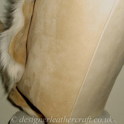 The Toscana Sheepskin Handbag has a Leather Base